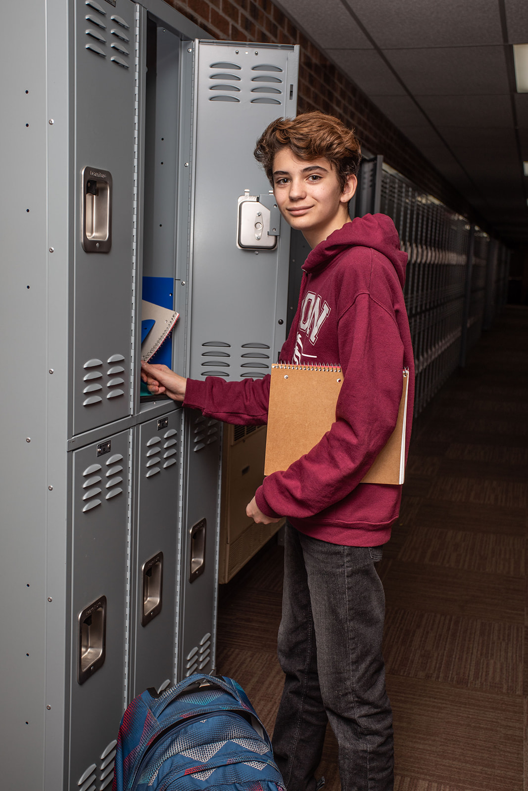 High School Boy at Locker